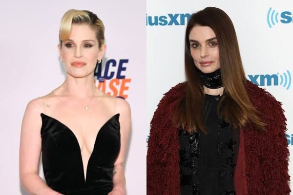 Aimee Osbourne posing at a public event during her music career.
